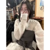 Now available the new Spring/Summer 2025 collection from Dongdaemun, South Korea, featuring a strappy strapless vest and a thin, slightly transparent shirt details Picture